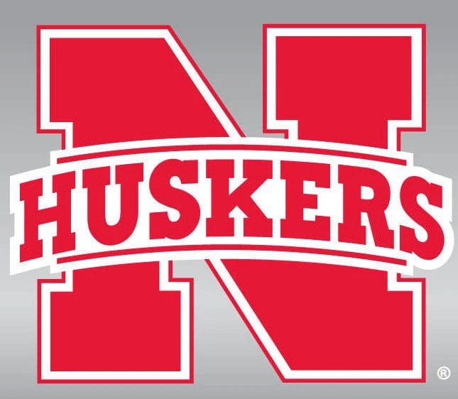 Red Huskers logo with a bold 'N' on a gray background.