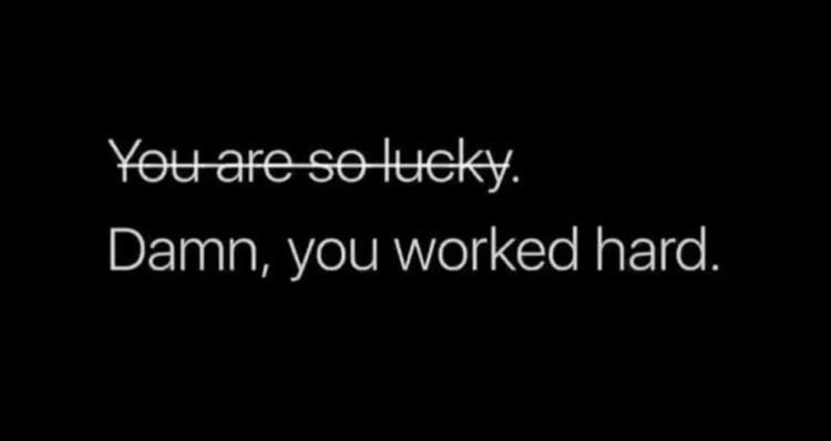 A motivational quote about hard work and luck on a dark background.