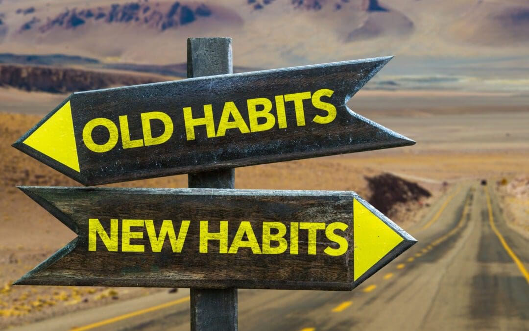 Directional signs contrasting old habits with new habits.