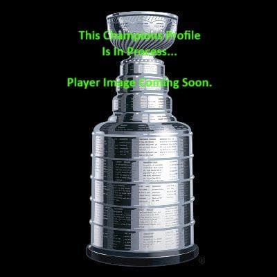 Stanley Cup trophy on display with green text overlay.