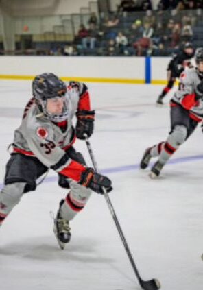 Ice hockey players competing intensely on the ice rink.