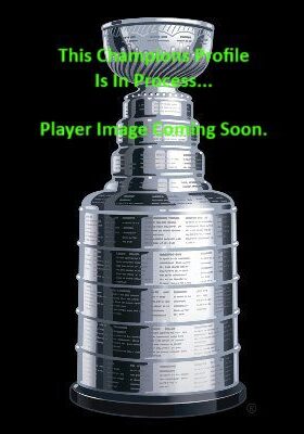Stanley Cup trophy on display with green text overlay.