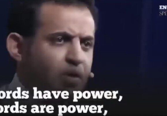 Man passionately speaking with a caption about power.